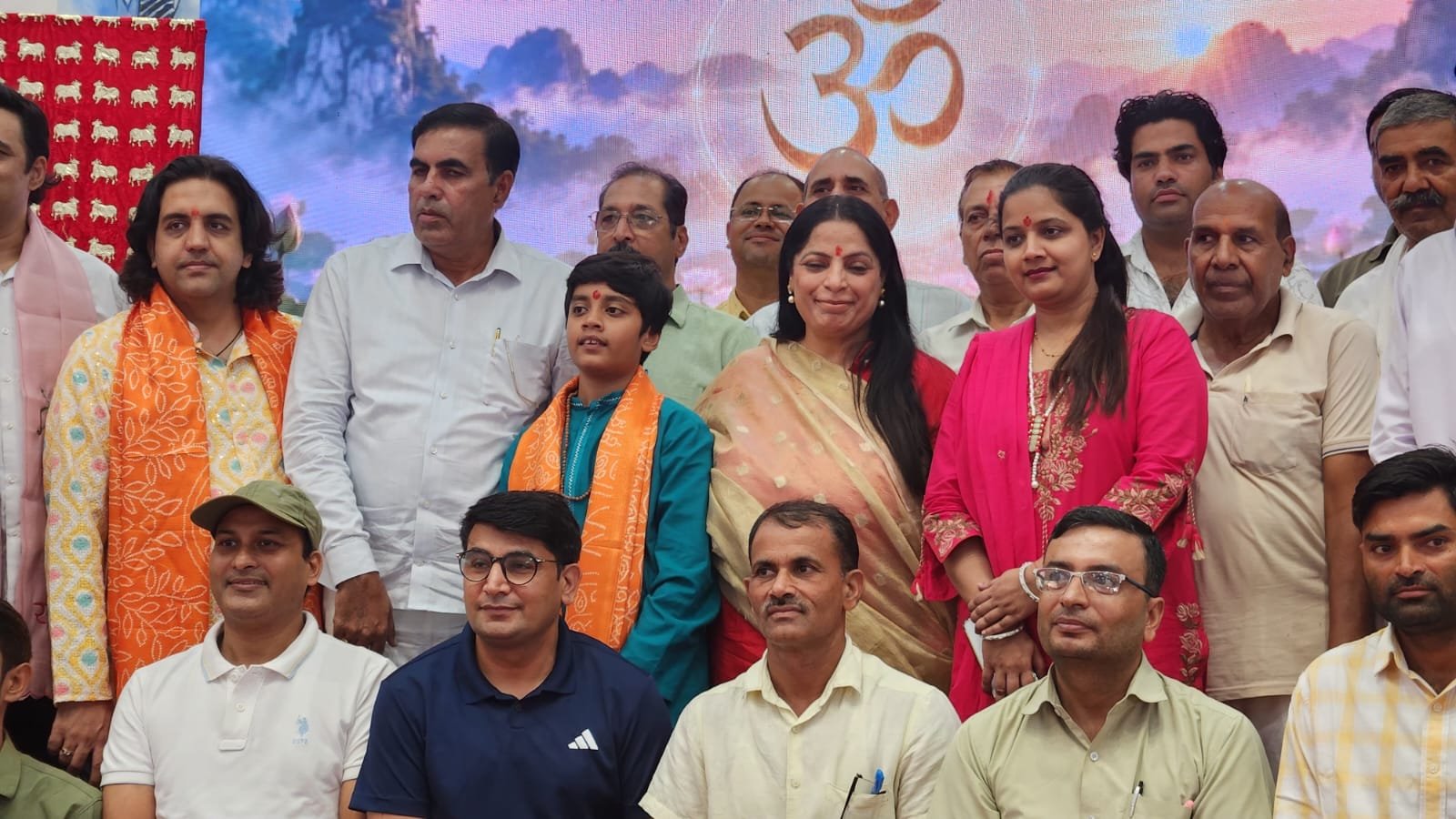 Isha Saini with guests on stage at the Jaunapur cultural program