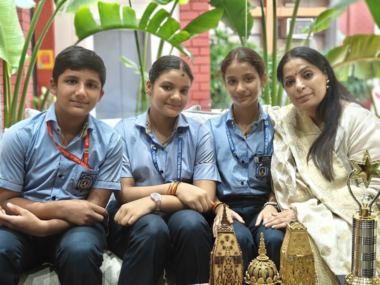 Isha Saini with students at Modern Public School