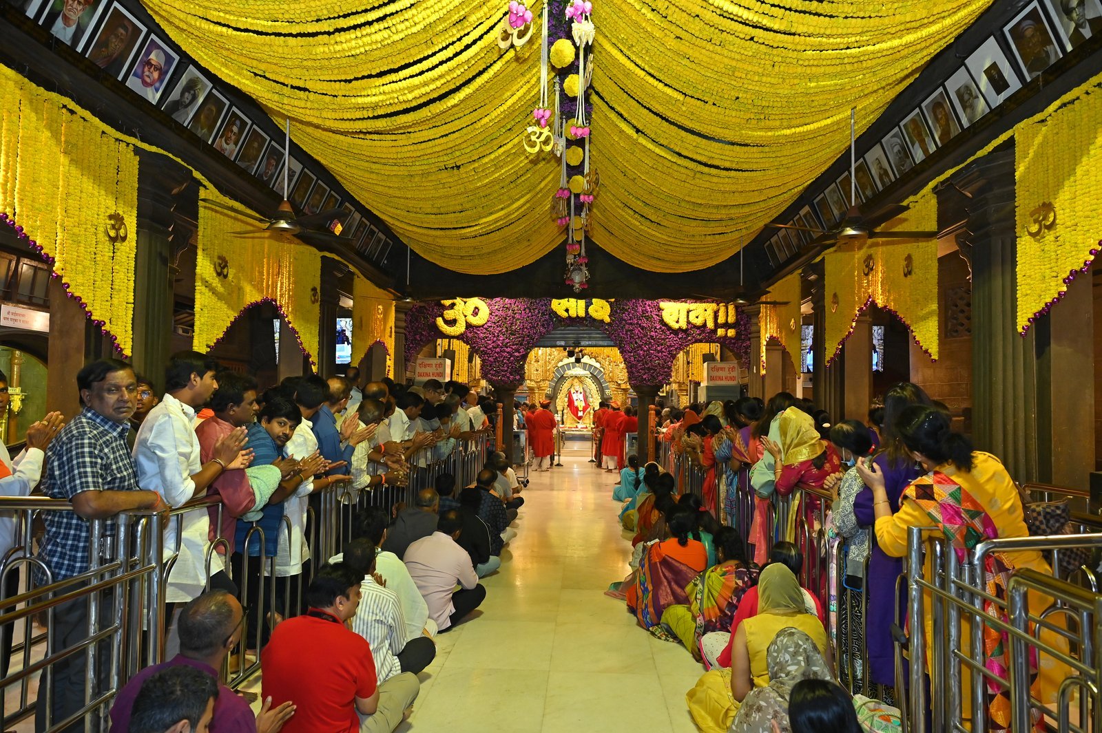 Shirdi hall draped in yellow marigold garlands